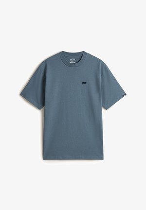 Blue cotton t-shirt with short sleeves, crew neck, and small black Vans logo on the left chest. Smooth texture and relaxed fit.