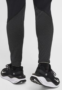 Nike Performance - Spodnie treningowe