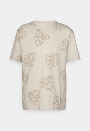 Beige T-shirt med korte ærmer med lysebrune tigeransigter spredt over stoffet, med rund halsudskæring og afslappet pasform.