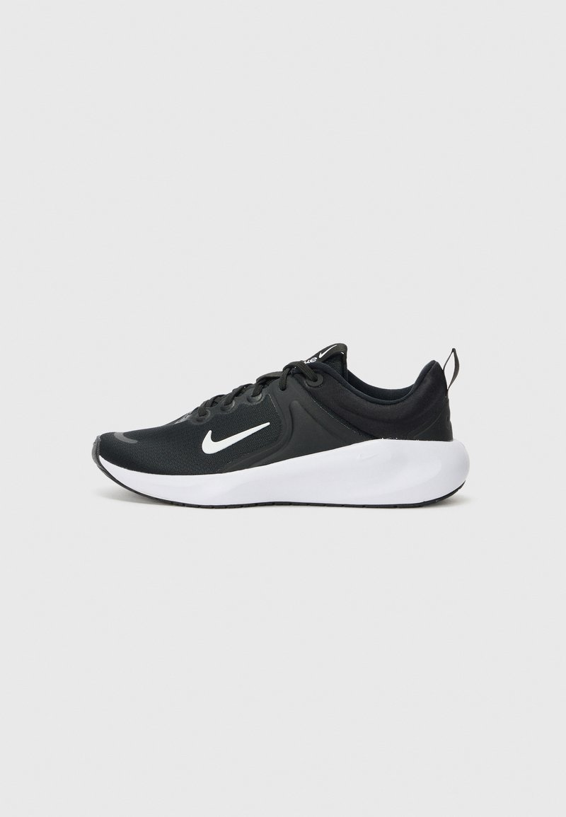 Black athletic shoe with a breathable fabric upper, white swoosh logo, smooth white midsole, and textured black outsole.
