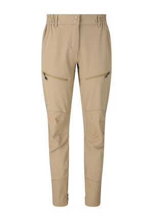 Pantalon beige slim avec taille élastique, fermeture à double bouton, poches zippées sur les cuisses, coutures aux genoux et sangles aux chevilles.