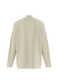 Beige, übergroßer Strickpullover mit weicher Textur, weiten Ärmeln und lockerer Passform. Besitzt ein dezentes Rippmuster und einen runden Ausschnitt.