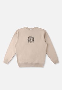 Bež dukserica s dugim rukavima, rebrastim ovratnikom i rubom, s centralno smještenim crnim amblemom s lovorovim detaljima. Glatka pamučna tekstura.