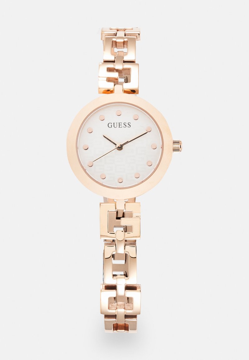 Montre-bracelet en or rose avec un cadran rond, un cadran texturé blanc et des marqueurs d'heure en or en forme de point. Présente un design de maillons géométriques sur le bracelet.