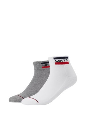 Calcetines cortos de Levi's en gris y blanco. Mezcla de algodón, con puños acanalados, detalles de logo y acentos en rojo y azul marino contrastantes en la parte superior.