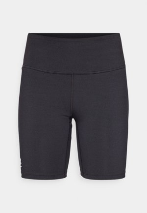 Black athletic shorts made of stretchy fabric, featuring a high waistband and flatlock stitching details. Designed for comfort and mobility.