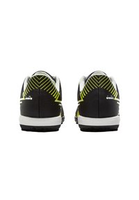 Scarpe sportive nere con tomaia in tessuto strutturato e dettagli in giallo neon, suola intermedia bianca e suola esterna in gomma nera resistente.