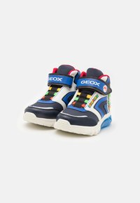 Blue and white high-top sneakers with colorful shoelaces, logo accents, padded collar, and a textured sole for grip.