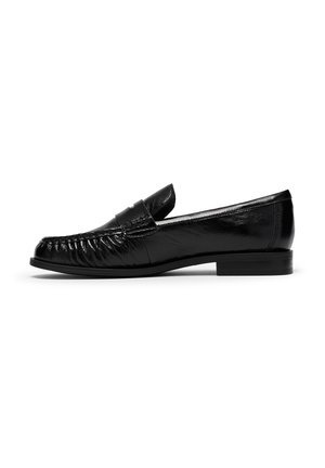 Black leather loafer with low heel, moccasin-style stitching, and a classic strap across the upper.