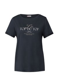 Navy blue cotton t-shirt with a round neckline, short sleeves, and text design: "Le TOP DU TOP - OWN THE DAY" in light beige.