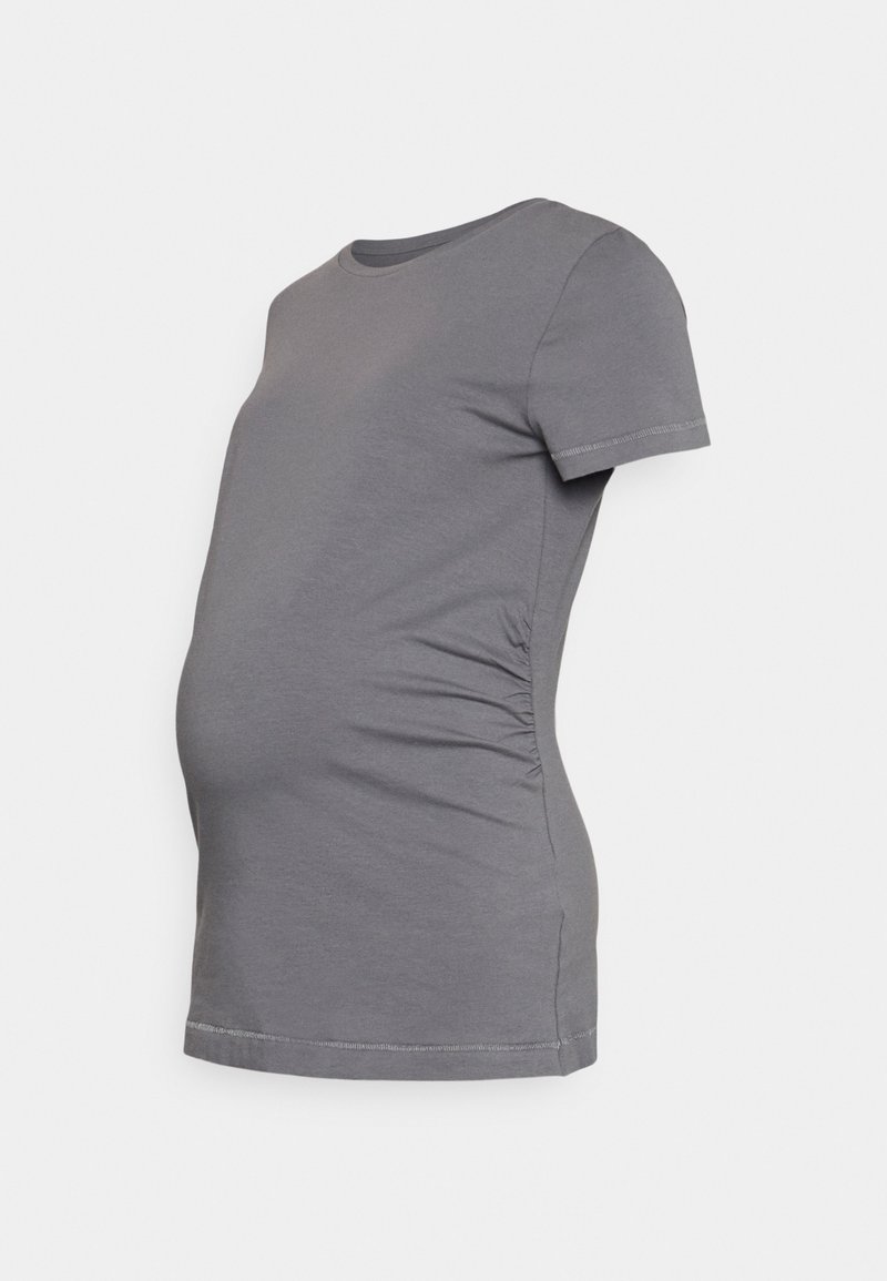T-shirt de maternidade cinza feito de algodão macio. Apresenta mangas curtas, gola redonda e costuras laterais franzidas para maior conforto na zona da barriga.