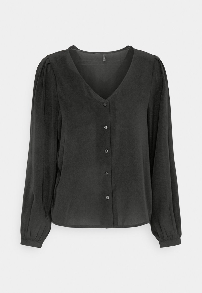 Blouse noire à manches longues avec col en V et boutons sur le devant, avec des épaules bouffantes et des poignets froncés.