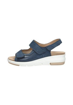 Marineblauwe sandaal met twee klittenbandsluitingen, open teen, textielmateriaal op het bovenwerk, witte lichtgewicht zool met een subtiele tanaccent.