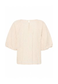 Blouse beige clair avec des manches bouffantes, ornée de broderies florales et d'une fermeture à boutons au dos. Texture lisse et coupe ample.