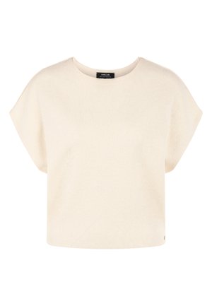 Cream-colored short-sleeve knit top with wide shoulders and a round neckline, featuring a small brand tag near the hem.