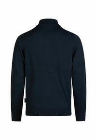 Marineblauer Pullover, Strickstoff, lange Ärmel, gerippter Kragen und Saum, schlichtes Design mit einem kleinen Etikett auf der unteren linken Seite.