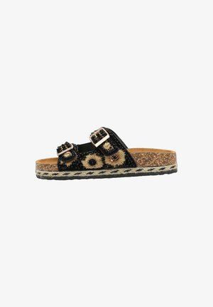 Sandalia tipo chancla negra con puntera abierta, suela de corcho, dos hebillas ajustables y bordado floral decorativo en beige con detalles de cuentas.