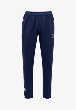 Donkerblauwe joggingsbroek van zacht materiaal, met een elastische tailleband, zijzakken en een taps toelopende pasvorm, voorzien van logo- en patroonaccenten.