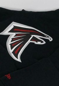 Black fabric featuring a prominent red and white Atlanta Falcons logo. The design includes sharp lines and a bold, sporty aesthetic.