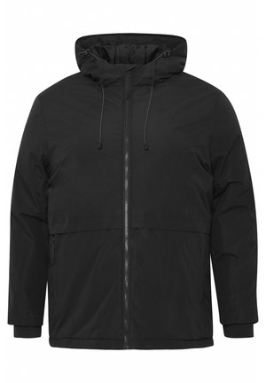 Sort vindjakke med hætte, frontlynlås, elastiske manchetter og en slank, glat tekstur. Har en justerbar snøre i hætten.