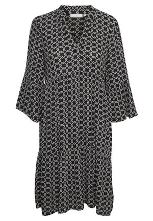 Zwarte midi-jurk met wit geometrisch kettingpatroon, lange uitlopende mouwen, V-halslijn en gelaagde rokdetails.