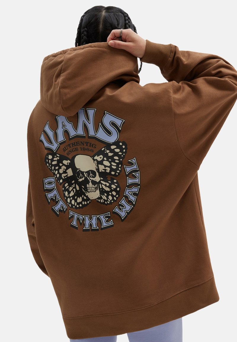 Brown hoodie with a large graphic on the back featuring a butterfly, skull, and text "VANS OFF THE WALL" in varying colors and styles.