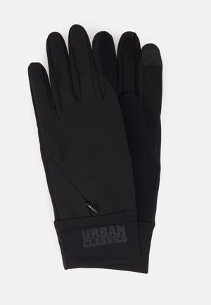 Sorte handsker med et stilrent design, der har en lynlåslomme, tekstureret tommelfinger til brug af berøringsskærm og blødt stoffinish.