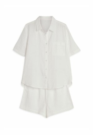 White short-sleeve shirt with button closure and pocket, paired with matching shorts. Made of lightweight, textured fabric.