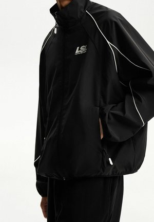 Übergangsjacke - black