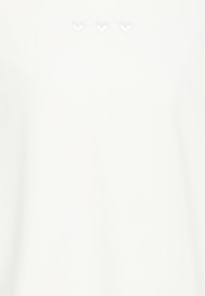 Valkoinen t-paita, jossa kolme kirjailtua sydämenmuotoa hillityssä sävyssä yläosassa edessä. Pehmeää puuvillakangasta, jossa sileä pinta.