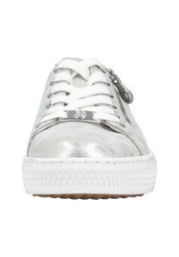 Silver synthetic sneakers with white laces and a side zipper. Textured sole and metallic finish. Features logo plate on the front.