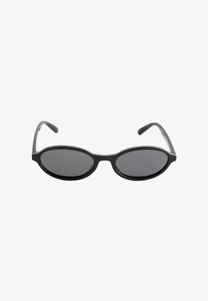 Schwarze, oval geformte Sonnenbrille mit dünnen Bügeln und dunkel getönten Gläsern auf weißem Hintergrund.