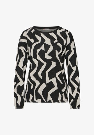 Camiseta de manga larga en blanco y negro con un patrón abstracto de zigzag, escote redondo y tejido texturizado. Puños elásticos en las mangas.