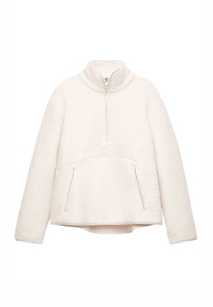 Cream-colored fleece pullover with a high collar, half-zip front, and front pockets. Soft texture and relaxed fit.