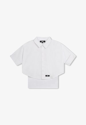 Biała krótką koszulka z krótkimi rękawami, z zapięciem na guziki z przodu i metką DKNY. Gładki materiał z wyraźnym kołnierzykiem i zakończeniem.