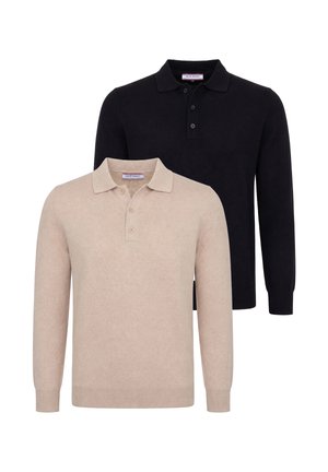Deux polos à manches longues, un beige et un noir, tous deux avec des cols boutonnés et des poignets et ourlets côtelés.