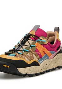 Multicolored hiking shoe featuring a mix of materials, including pink, orange, green, and beige textiles, with a textured Vibram sole.