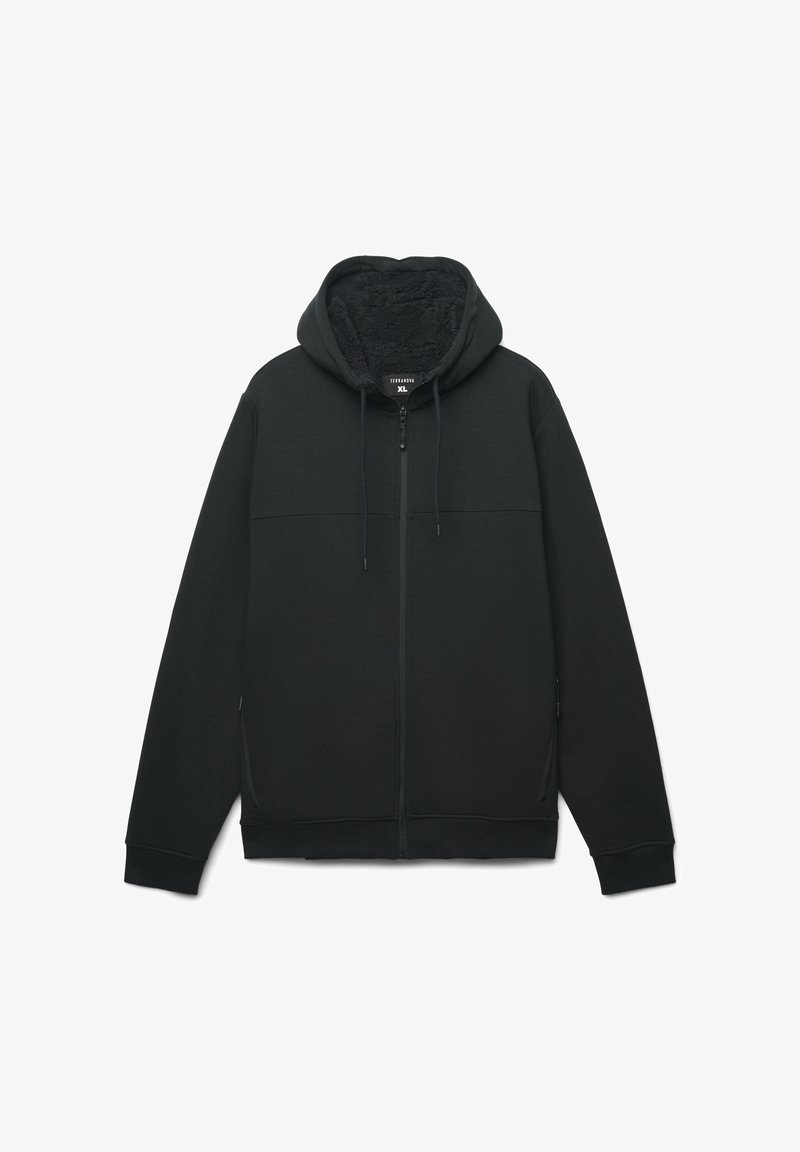 Felpa nera con cappuccio e chiusura a zip, foderato internamente in modo morbido, dotata di due tasche laterali e corde di regolazione sul cappuccio.