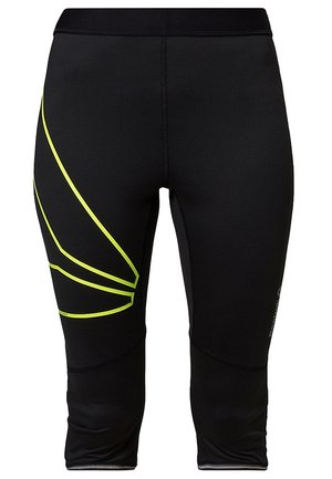 Zwarte atletische leggings tot op de knie met gele geometrische lijnen op de linker dij en een aansluitende elastische tailleband.