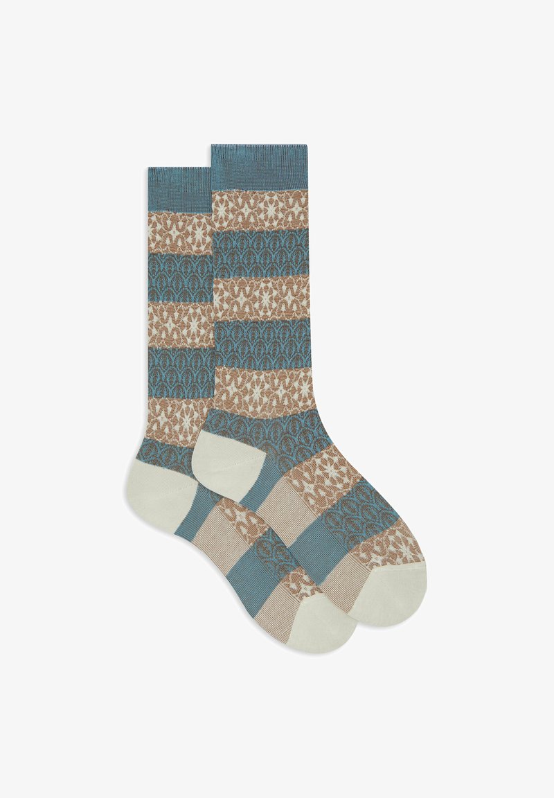 Knitted socks featuring a blue, brown, and cream geometric pattern with textured stripes and a reinforced white toe.