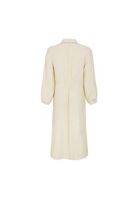 Knee-length cream dress with a soft texture, collar, and three-quarter puff sleeves; features gathered back detailing.