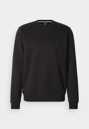 Black sweatshirt in soft fabric with a crew neck, long sleeves, and ribbed cuffs. Features a small logo on the chest for detail.