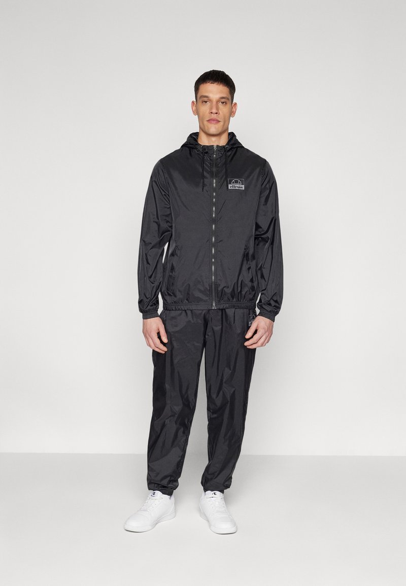 Ellesse - ROZINA JACKET AND PANT SET - Trenirka - black, Povečajte