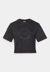 Black cropped t-shirt in soft cotton with a crew neck. Features a subtle circular "CHAMPIONS" print on the front and short sleeves.