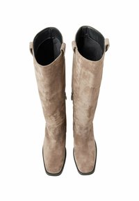 Suede knee-high boots in light grey with a square toe, smooth black interior, and side zippers for easy wear.