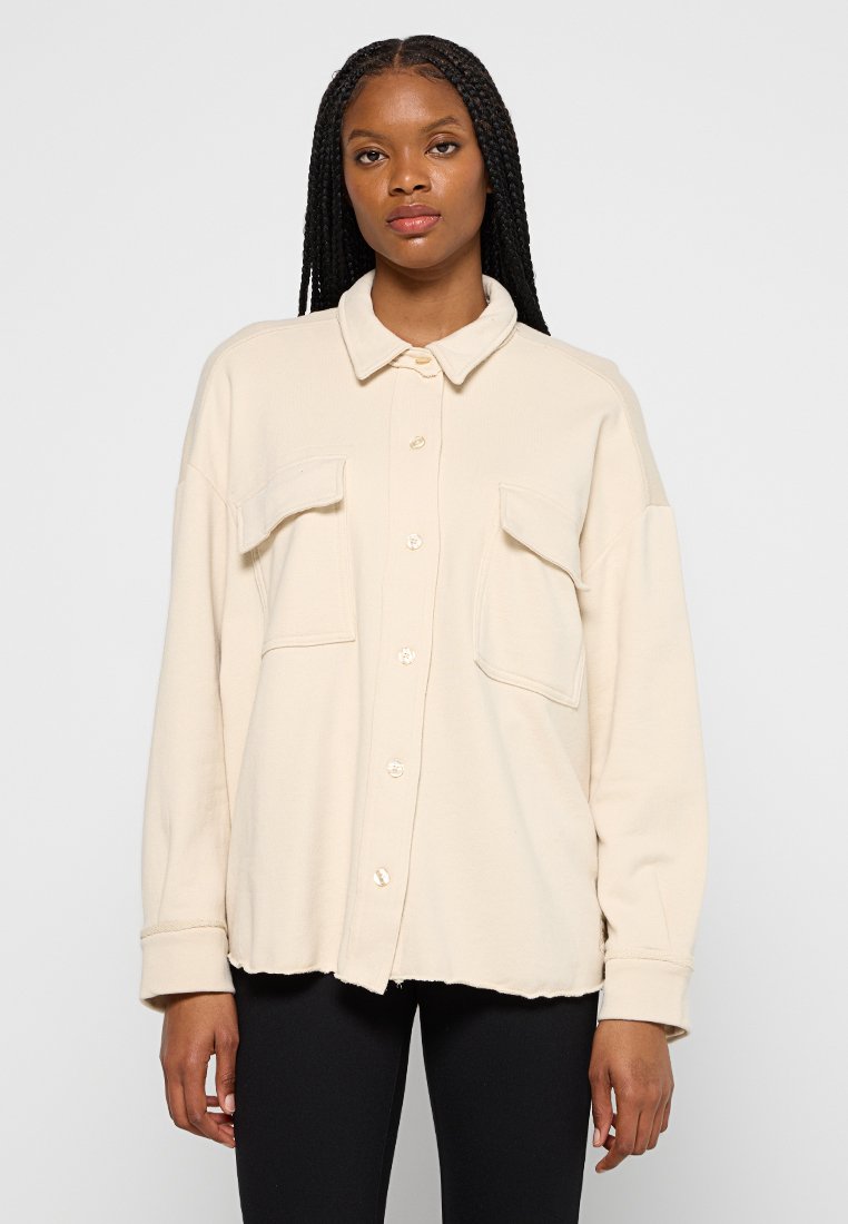 DKNY Lichte jas beige