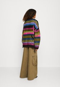The Ragged Priest Pullover - multi-coloured