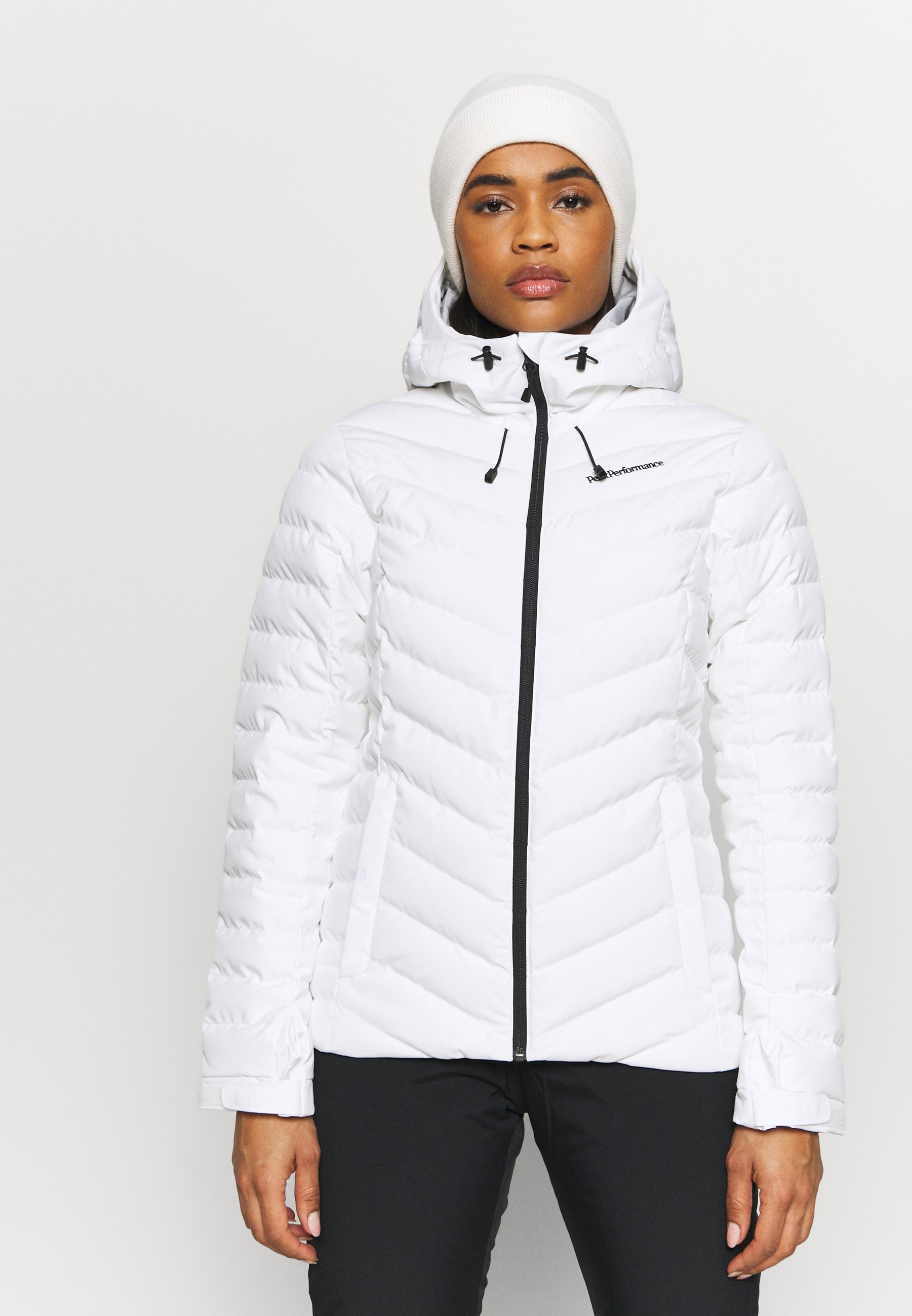 peak performance white ski jacket