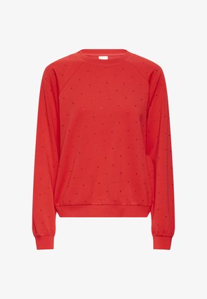 Sweat-shirt rouge à manches longues avec de petites perles noires et argentées disposées régulièrement sur le devant et les manches, avec des poignets et un ourlet côtelés.
