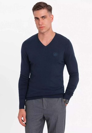- Sweter